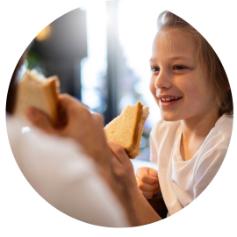 child eating bread